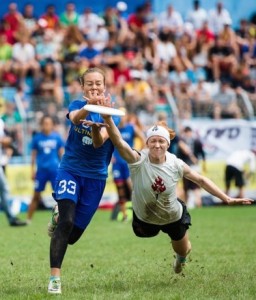 Kelly Johnson dives for disc while battling a Fury player in the championship game.