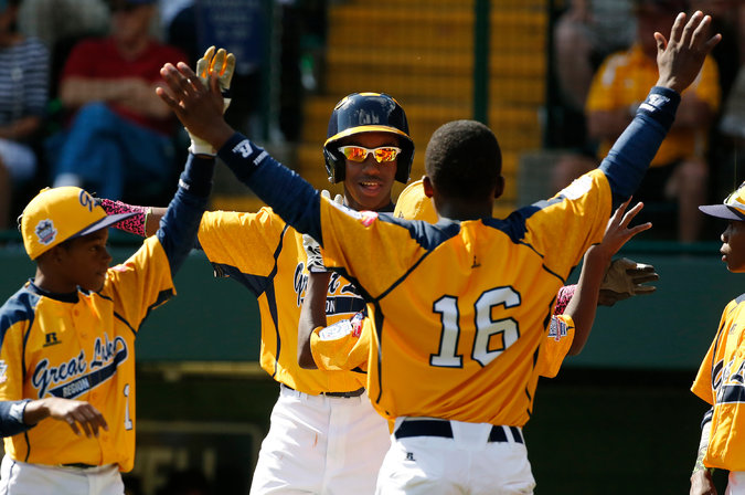 Members of Chicago's Jackie Robinson West Little League team celebrate.